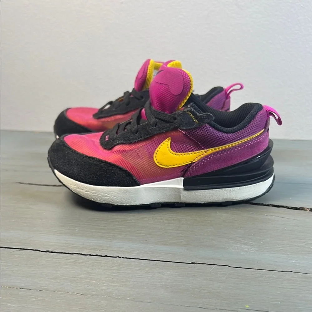 Nike Vibrant Pink and Black Shoes with Yellow Swoosh. size10c          order(85)